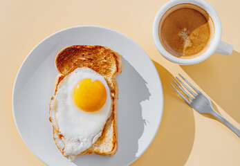 fried Toast bread with four different types of cooked chicken eggs, scrambled eggs, fried eggs, poached egg and creamed egg. Breakfast of chicken eggs.