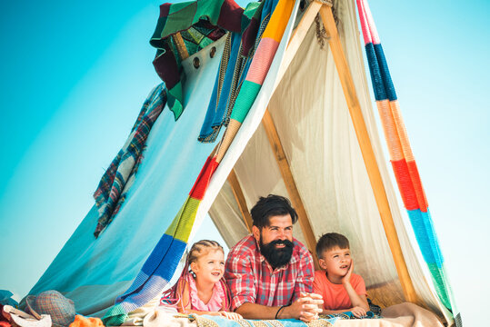 Summer outdoor. Family camping. Fathers day. Father and children summertime outdoor.