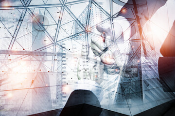Top view Double exposure photo.Picture mix  building city and young man putting hands together.show Confident,partnership,Collaboration.Photo team success and winner concept idea.