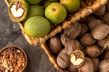 Newly collected fresh walnuts gathered together.