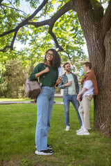 Obraz premium A group of young people spending time together in the park