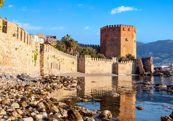 Close up photo of Red Tower which locally  known as Kızıl Kule in Alanya, Antalya, Turkey.