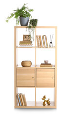 Wooden bookcase with decor on white background