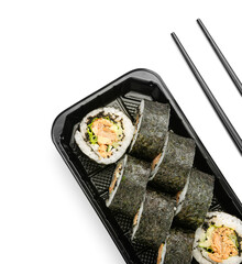 Set of delicious sushi rolls on white background