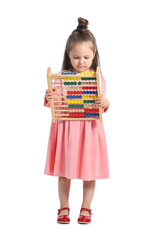 Adorable little girl with abacus on white background