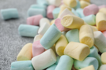 Tasty marshmallows on grey background, closeup