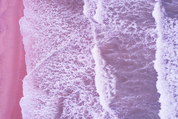 Top view of amazing pink sand beach and waves sea form copy space available nature background High angle view sea