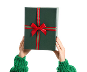 Hands with Christmas gift on white background