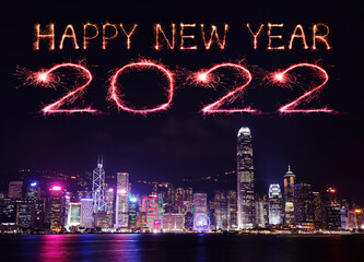 2022 Happy New Year fireworks over Hong Kong cityscape at night