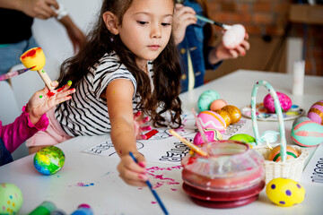 Kids coloring painting eggs easter holiday
