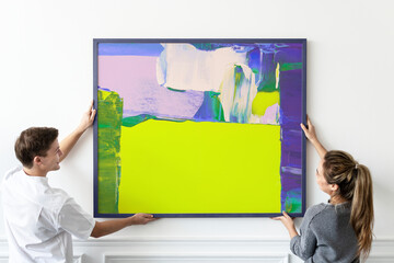 Couple hanging frame, home decor and interior with abstract painting