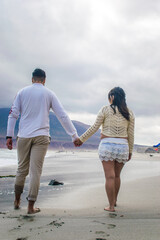 couple walking on the beach