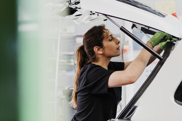 Female automotive mechanic breaking stereotyped jobs