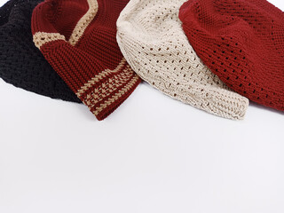 some colorful skullcaps isolated on white background