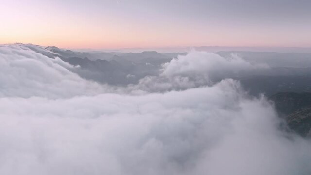 Pink sunset sky white clouds. Puffy fluffy white blue lilac cloudscape. Cumulus clouds timelapse. Summer sky time lapse. Majestic amazing sky with soft white clouds. Cloud time lapse background 4K