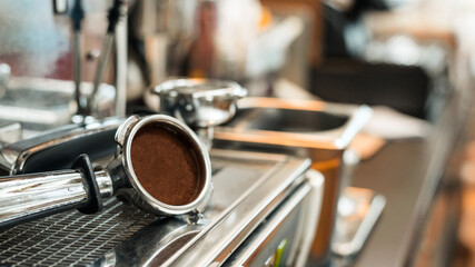 coffee tamper to the coffee machine