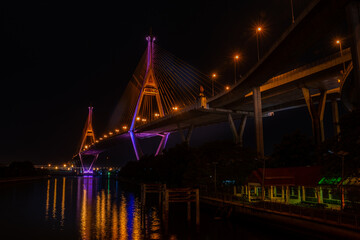 Fototapeta na wymiar Samutprakan, thailand - jun, 2019 : Twilight scenes of The Bhumibol Bridge,also known as the Industrial Ring Road Bridge is part of the 13 km . The bridge crosses the Chao Phraya River twice.