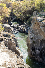 Lozoya river, with the colors of autumn, as it passes through the Sierra de Guadarrama in the province of Madrid