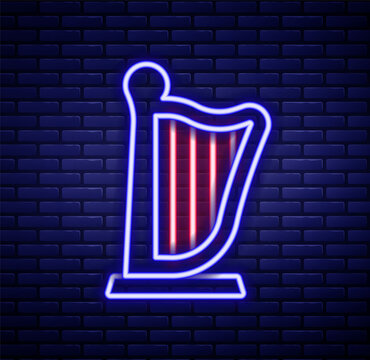 Glowing neon line Harp icon isolated on brick wall background. Classical music instrument, orhestra string acoustic element. Colorful outline concept. Vector