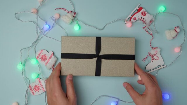 Christmas gift box with decaration. Xmas and Happy New Year composition. Flat lay, top view