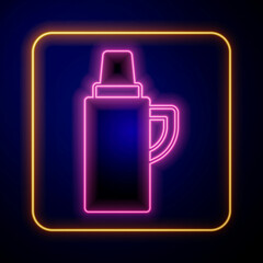 Glowing neon Thermos container icon isolated on black background. Thermo flask icon. Camping and hiking equipment. Vector