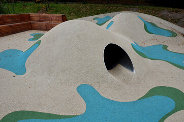 dreamy white rubber landscape with scoops and colorful spots on the playground. stainless steel...