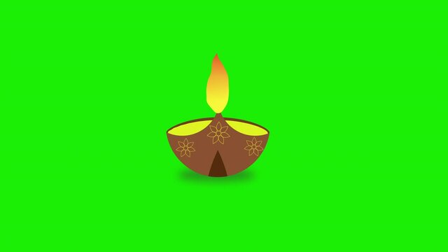 An animation lighten diya lamp on green screen for diwali celebration