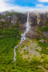 Obraz premium Waterfall near Briksdal glacier - Norway