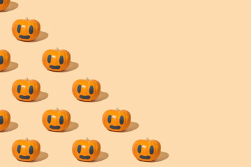 Seamless pattern with Halloween pumpkin on yellow background.