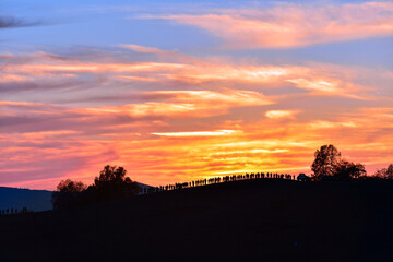 Obraz premium Photographers taking pictures of the beautiful sunset in Paxiang, Inner Mongolia