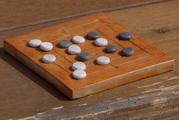 Reconstruction of roman board game Nine mens morris or mill game
