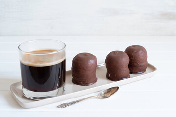 Israeli winter dessert Krembo. Chocolate covered marshmallow cookies.