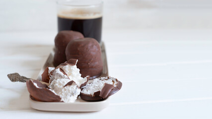 Chocolate covered marshmallow cookies. Israeli winter dessert. Krembo.