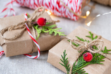 Obraz na płótnie Canvas Christmas gifts in craft packaging