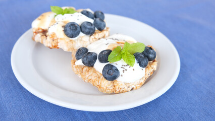 Sandwiches with cream cheese and blueberries. Healthy breakfast. Healthy food, healthy lifestyle