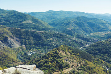 Beautiful Summer Mountain Landscape with Green Hills and Cloudy Sky .Bov Village in  Balkan Mountain ,Bulgaria 