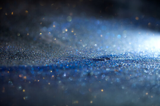 niebieskie brokatowe tło, kartka na Boże Narodzenie, błyszczące niebieskie tło