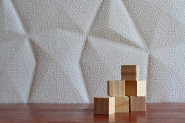 Wooden blocks cube on table with copy space