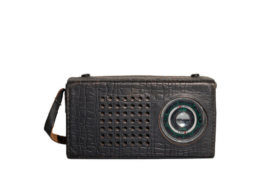 Old vintage Soviet retro radio in a black leather case isolated on white background