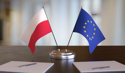 Polish and EU flags on table. Negotiation between European Union and Poland. 3D rendered illustration. - obrazy, fototapety, plakaty