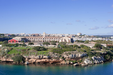 L'Illa del Rei Hospital Island in the middle of the main navigable entry channel to Mahon in Menorca in the Mediterranean Sea