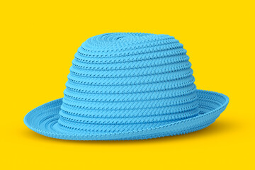 Vintage blue straw beach sun hat isolated on yellow and sun protection