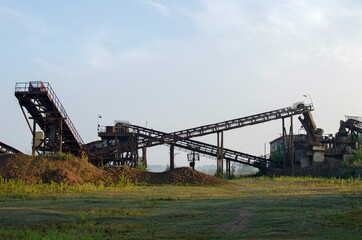Fototapeta na wymiar Gravel crusher. View of gravel factory. Rock stone crushing machine