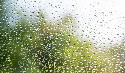 Raindrops on window glass - obrazy, fototapety, plakaty