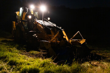 Excavator during night work