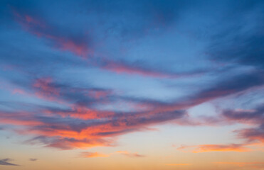 Naklejka na ściany i meble Colorful sunset sky background