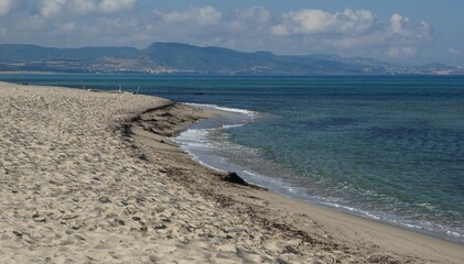 sand and crystal water on the Li Junchi beach in Sardinia
