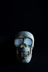 human skull with blue eyeballs