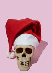 human skull with Santa Claus hat