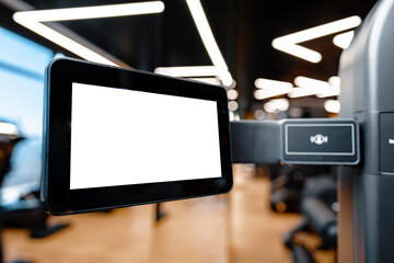 Close up of white screen on gym apparatus in a luxury gym